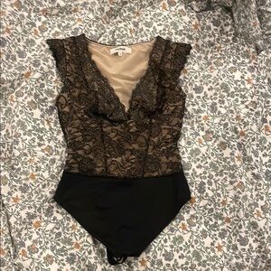 Black Lace Bodysuit with Deep V-Neckline